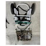 2 Tree Stands, One w/ Wheels